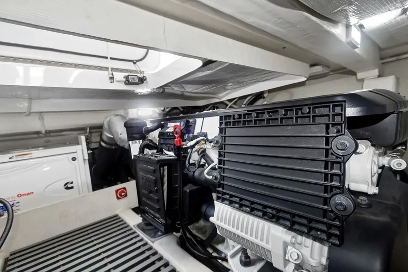 Pour It On Yacht Photos Pics Engine room of 2017 Tiara Yachts C39 Coupe, showcasing mechanical components and equipment.