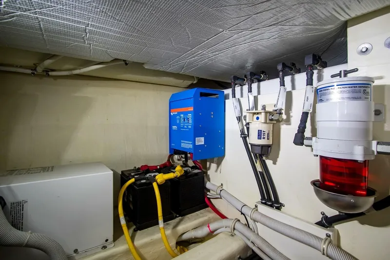 Pour It On Yacht Photos Pics Engine room of 2017 Tiara Yachts C39 Coupe with electrical and fuel systems.