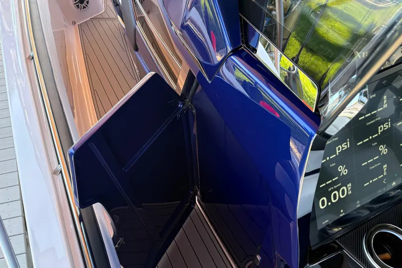  Yacht Photos Pics 2024 Nor-Tech 400 Supersport dashboard with digital display and sleek interior design.