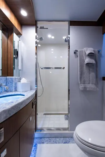Congvoyage Yacht Photos Pics Modern bathroom in 2020 Hargrave G120 yacht with glass shower and marble countertop.