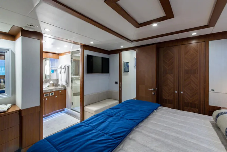 Congvoyage Yacht Photos Pics Luxurious bedroom and bathroom in a 2020 Hargrave G120 yacht.