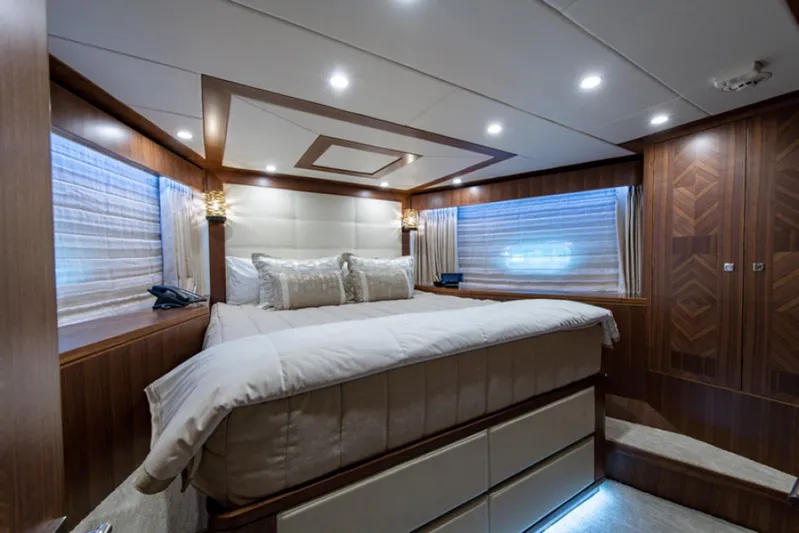 Congvoyage Yacht Photos Pics Luxurious bedroom interior of 2020 Hargrave G120 yacht with modern lighting and wood finishes.