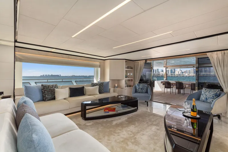 Rocket One Yacht Photos Pics Luxurious interior of 2022 Gulf Craft Majesty 120 yacht with elegant seating and ocean view.