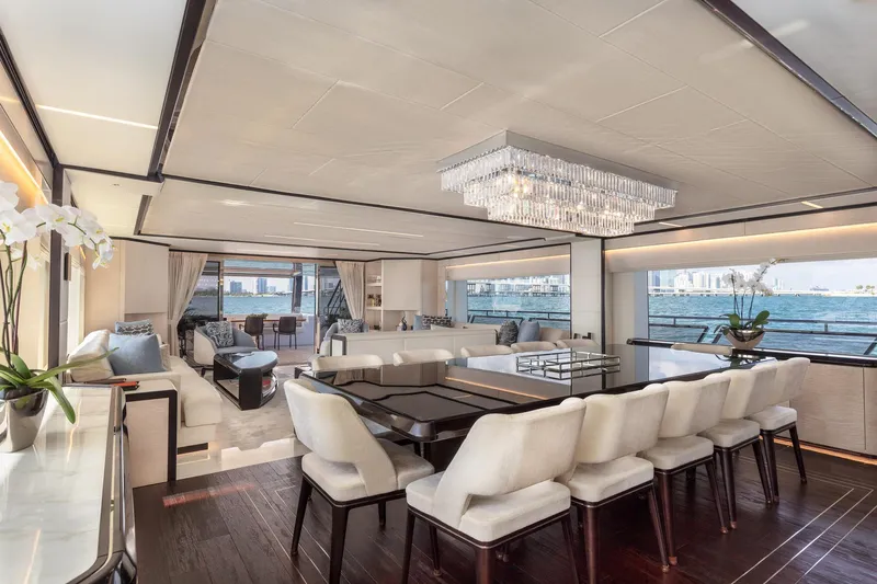 Rocket One Yacht Photos Pics Luxurious interior of 2022 Gulf Craft Majesty 120 yacht with elegant dining area and sea view.