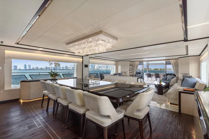 Rocket One Yacht Photos Pics Luxurious interior of 2022 Gulf Craft Majesty 120 yacht with elegant dining and seating areas.