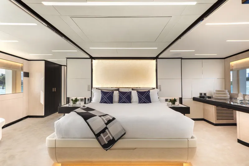 Rocket One Yacht Photos Pics Luxurious bedroom interior on 2022 Gulf Craft Majesty 120 yacht, featuring modern design and elegant decor.