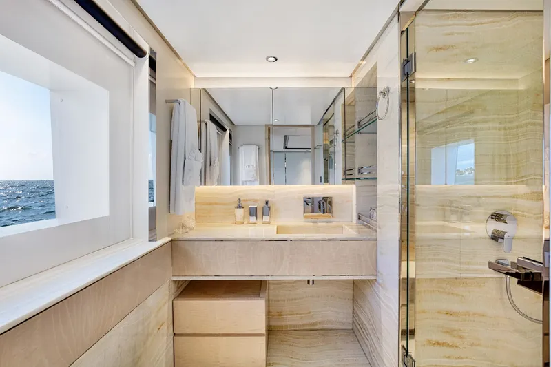 Rocket One Yacht Photos Pics Luxurious bathroom interior on 2022 Gulf Craft Majesty 120 yacht, featuring modern fixtures and ocean view.