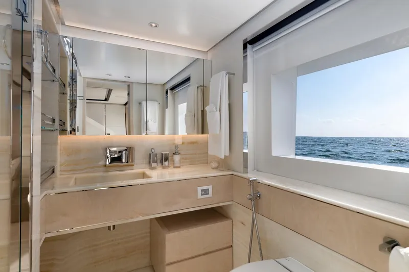 Rocket One Yacht Photos Pics Luxurious bathroom interior on 2022 Gulf Craft Majesty 120 yacht with ocean view.