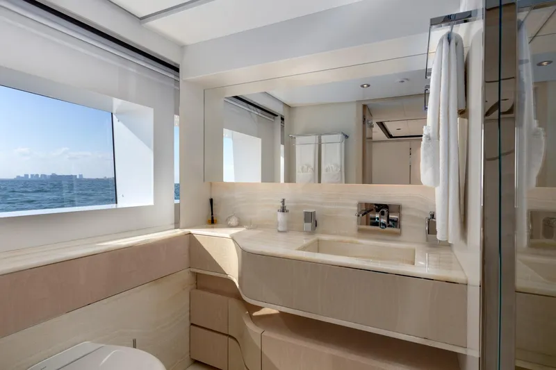 Rocket One Yacht Photos Pics Luxurious bathroom interior on 2022 Gulf Craft Majesty 120 yacht with ocean view.