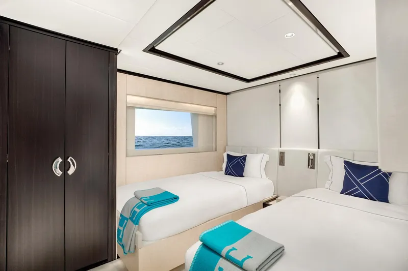 Rocket One Yacht Photos Pics Luxurious twin bedroom on 2022 Gulf Craft Majesty 120 yacht with ocean view.