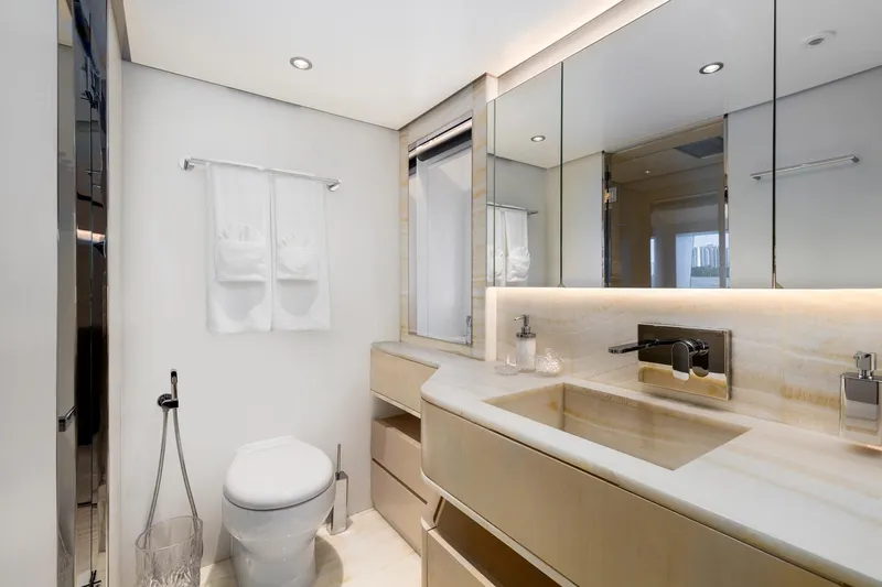 Rocket One Yacht Photos Pics Luxurious bathroom in 2022 Gulf Craft Majesty 120 yacht, featuring modern fixtures and elegant design.
