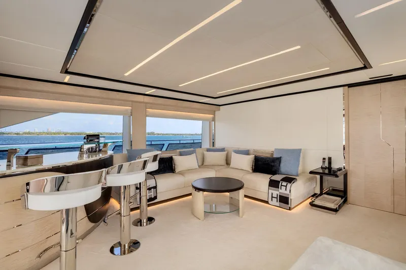 Rocket One Yacht Photos Pics Luxurious interior of 2022 Gulf Craft Majesty 120 yacht with modern seating and ocean view.