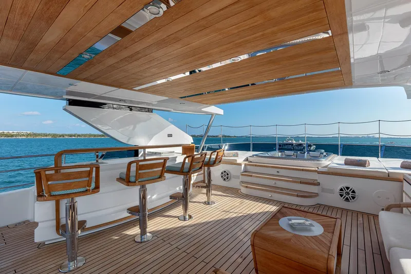 Rocket One Yacht Photos Pics Luxurious 2022 Gulf Craft Majesty 120 yacht deck with bar and ocean view.