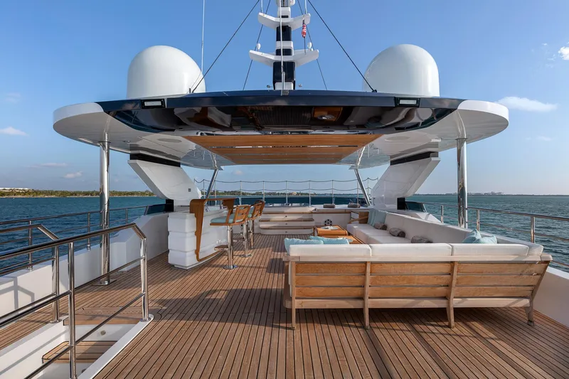 Rocket One Yacht Photos Pics Luxurious 2022 Gulf Craft Majesty 120 yacht deck with elegant seating and ocean view.
