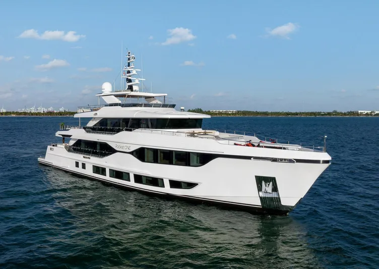 Rocket One Yacht Photos Pics Luxury yacht Gulf Craft Majesty 120, 2022 model, cruising on open water under clear skies.