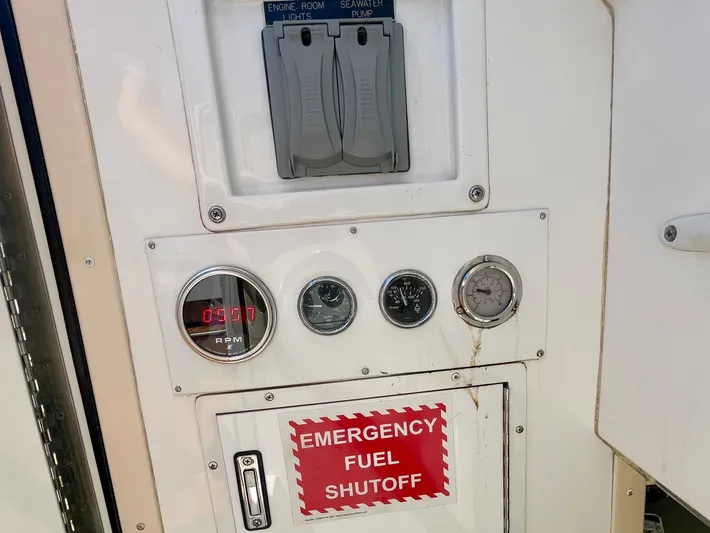 My Way Yacht Photos Pics Control panel of a 1998 Viking 50 Convertible boat with emergency fuel shutoff.