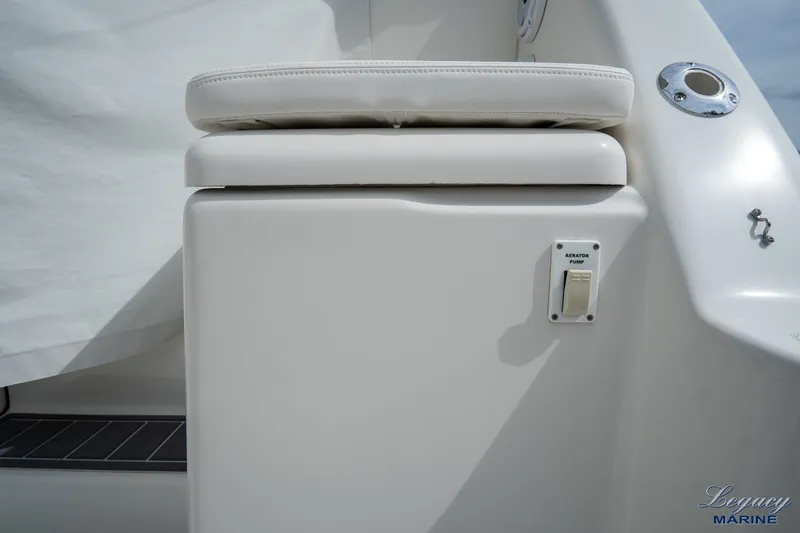 Legacy Yacht Photos Pics 2003 Tiara Yachts 4200 Open boat seat with aerator pump switch.