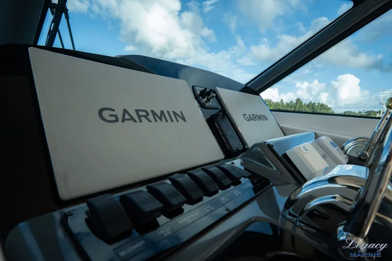 Legacy Yacht Photos Pics Helm of 2003 Tiara Yachts 4200 Open with Garmin navigation systems.