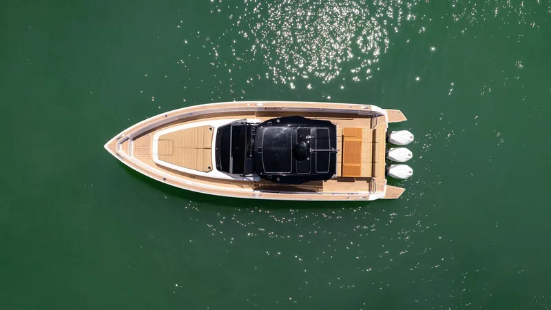  Yacht Photos Pics Aerial view of 2025 Pardo Yachts 38 on shimmering green water.