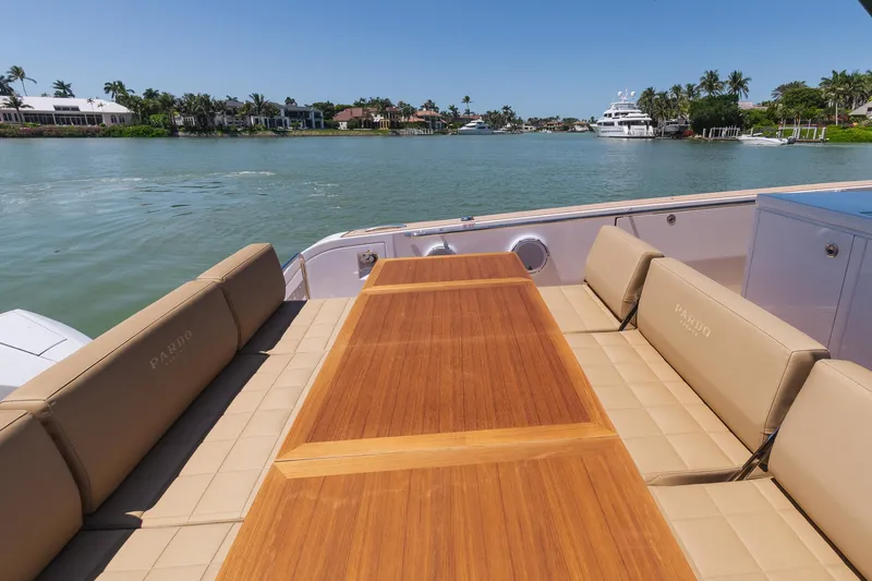  Yacht Photos Pics Luxury Pardo Yachts 38, 2025 model, featuring elegant deck seating and scenic waterfront view.