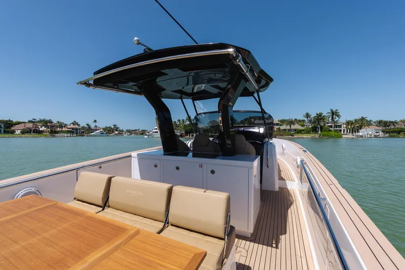  Yacht Photos Pics 2025 Pardo Yachts 38 cruising on a sunny day, featuring sleek design and luxurious seating.