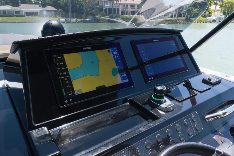  Yacht Photos Pics Helm of 2025 Pardo Yachts 38 with dual Simrad displays and joystick control.