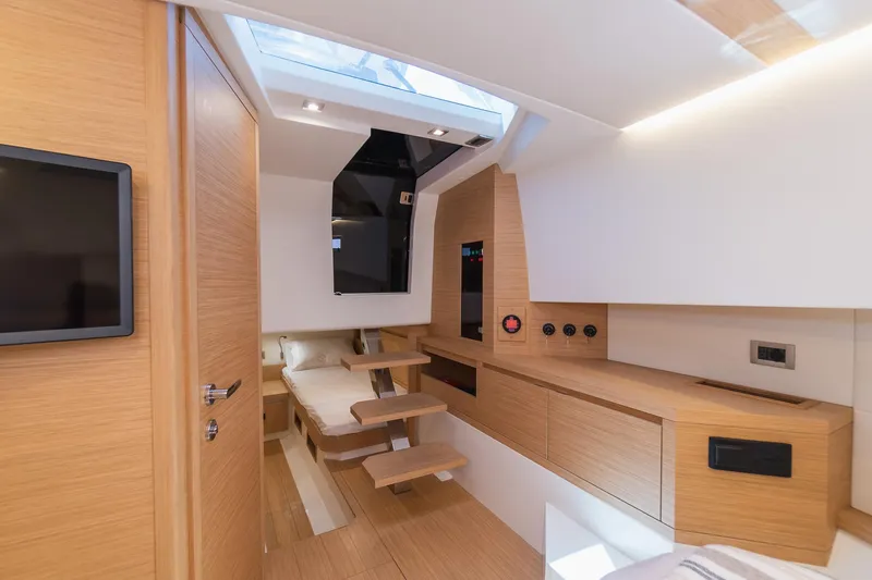  Yacht Photos Pics Luxurious interior of 2025 Pardo Yachts 38, featuring modern wood finishes and sleek design.