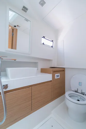  Yacht Photos Pics Modern bathroom in 2025 Pardo Yachts 38, featuring sleek design and wooden cabinetry.