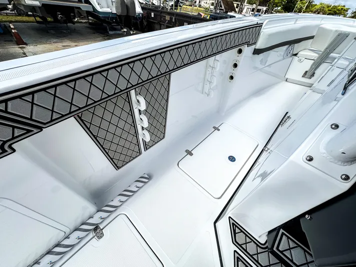  Yacht Photos Pics 2025 Wellcraft 302 Fisherman boat interior with sleek design and modern features.