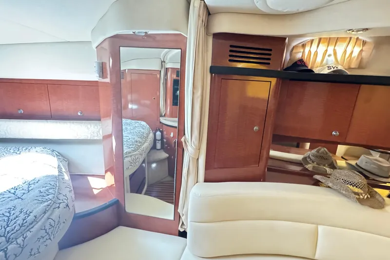  Yacht Photos Pics Luxurious interior of 2005 Sea Ray 340 Sundancer yacht with elegant wood cabinetry.
