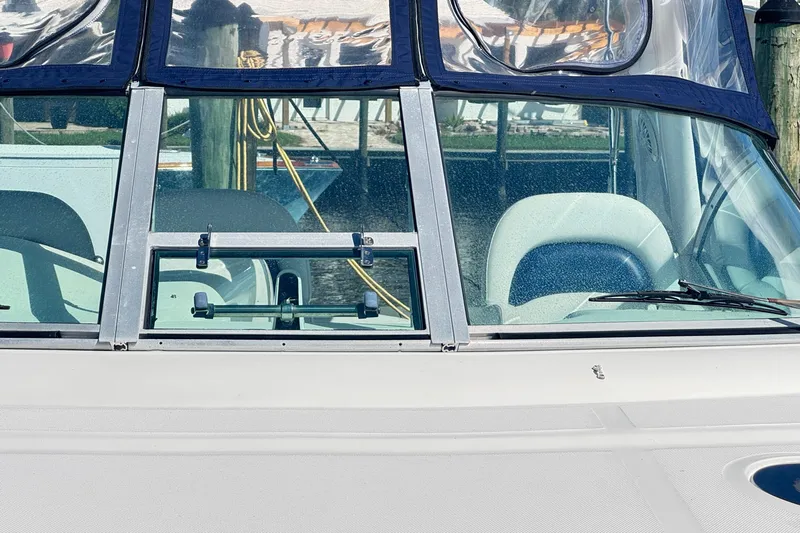 Yacht Photos Pics 2005 Sea Ray 340 Sundancer boat windshield and cockpit view at dock.