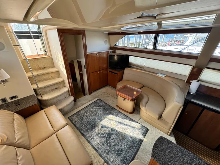 Full House Yacht Photos Pics Luxurious interior of 2006 Meridian 368 Motoryacht with plush seating and elegant design.