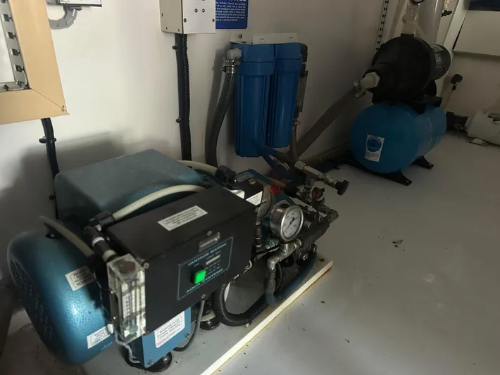 Gitana Yacht Photos Pics Engine room equipment on a 2000 Viking Enclosed Flybridge yacht.