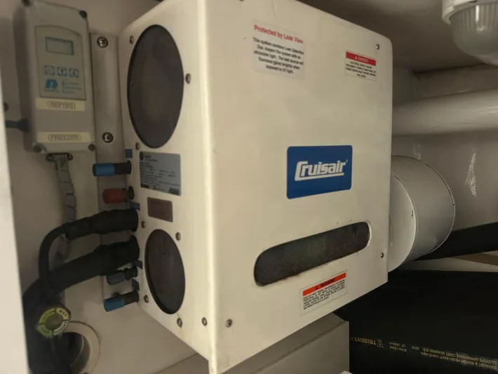 Gitana Yacht Photos Pics Cruisair unit in 2000 Viking Enclosed Flybridge, featuring control panel and wiring.