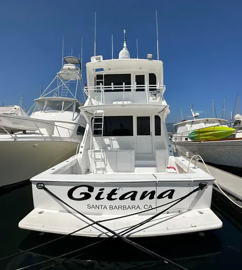 Gitana Yacht Photos Pics 2000 Viking Enclosed Flybridge yacht docked in Santa Barbara marina.
