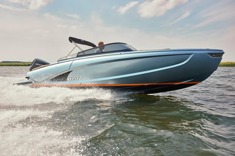  Yacht Photos Pics 2026 Flynt Yachts Speedera 26 OB cruising on water, showcasing sleek design and performance.