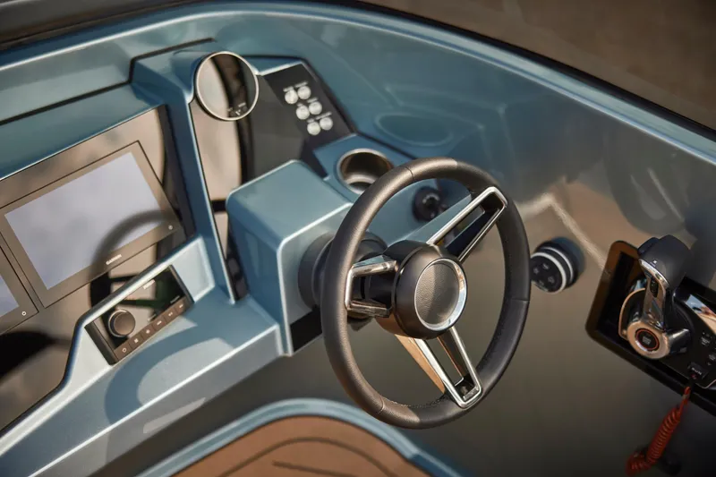  Yacht Photos Pics 2026 Flynt Yachts Speedera 26 OB dashboard with steering wheel and modern controls.