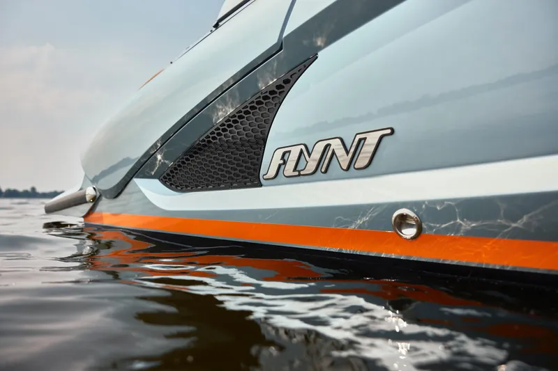  Yacht Photos Pics 2026 Flynt Yachts Speedera 26 OB on water, showcasing sleek design and branding.