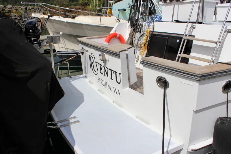 Rc Venture Yacht Photos Pics Ocean Alexander 44 yacht, 1989 model, docked with visible name and life preserver.