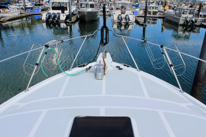 Rc Venture Yacht Photos Pics Bow view of 1989 Ocean Alexander 44 yacht docked in a marina.