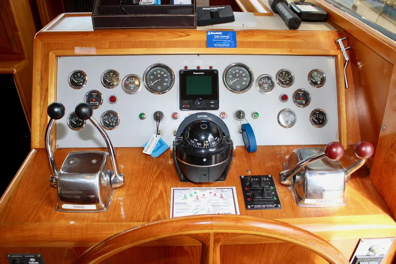 Rc Venture Yacht Photos Pics Control panel of a 1989 Ocean Alexander 44 yacht with gauges and levers.
