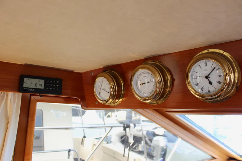 Rc Venture Yacht Photos Pics Interior of 1989 Ocean Alexander 44 yacht with brass instruments and digital display.