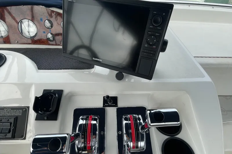 Yacht Photos Pics 1999 Bayliner 3988 Motoryacht helm with Garmin display and dual throttle controls.