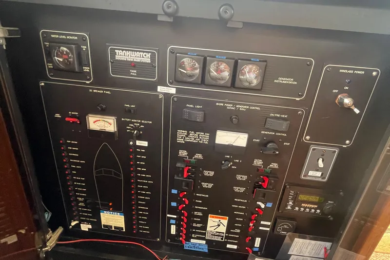  Yacht Photos Pics Control panel of a 1999 Bayliner 3988 Motoryacht, featuring gauges and switches.