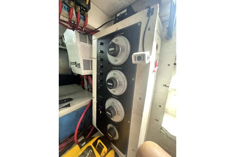  Yacht Photos Pics Electrical panel on a 1999 Bayliner 3988 Motoryacht, featuring multiple switches and wiring.
