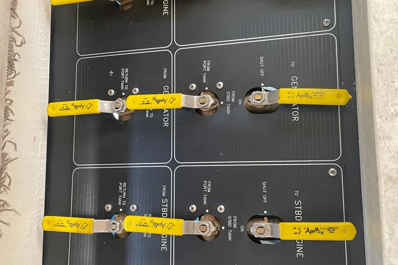  Yacht Photos Pics Control panel with yellow levers on a 1999 Bayliner 3988 Motoryacht.
