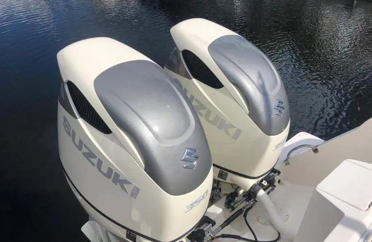 Soggy Dollars Yacht Photos Pics Twin Suzuki outboard engines on a 2007 Intrepid 35 Walkaround boat.