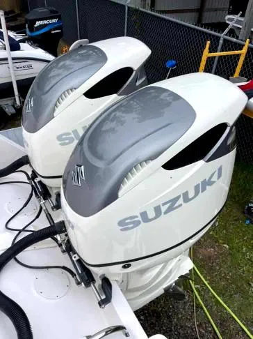 Soggy Dollars Yacht Photos Pics Twin Suzuki outboard motors on a 2007 Intrepid 35 Walkaround boat.