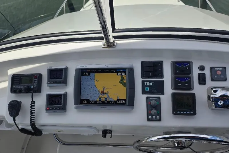 Chinook Yacht Photos Pics Control panel of a 2010 American Tug 49 Limited with navigation and communication equipment.
