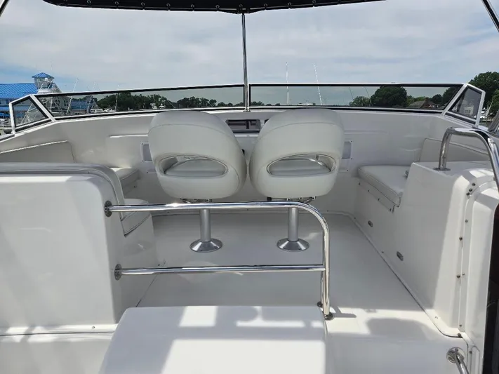 Chinook Yacht Photos Pics 2010 American Tug 49 Limited boat interior with white seating and helm station.